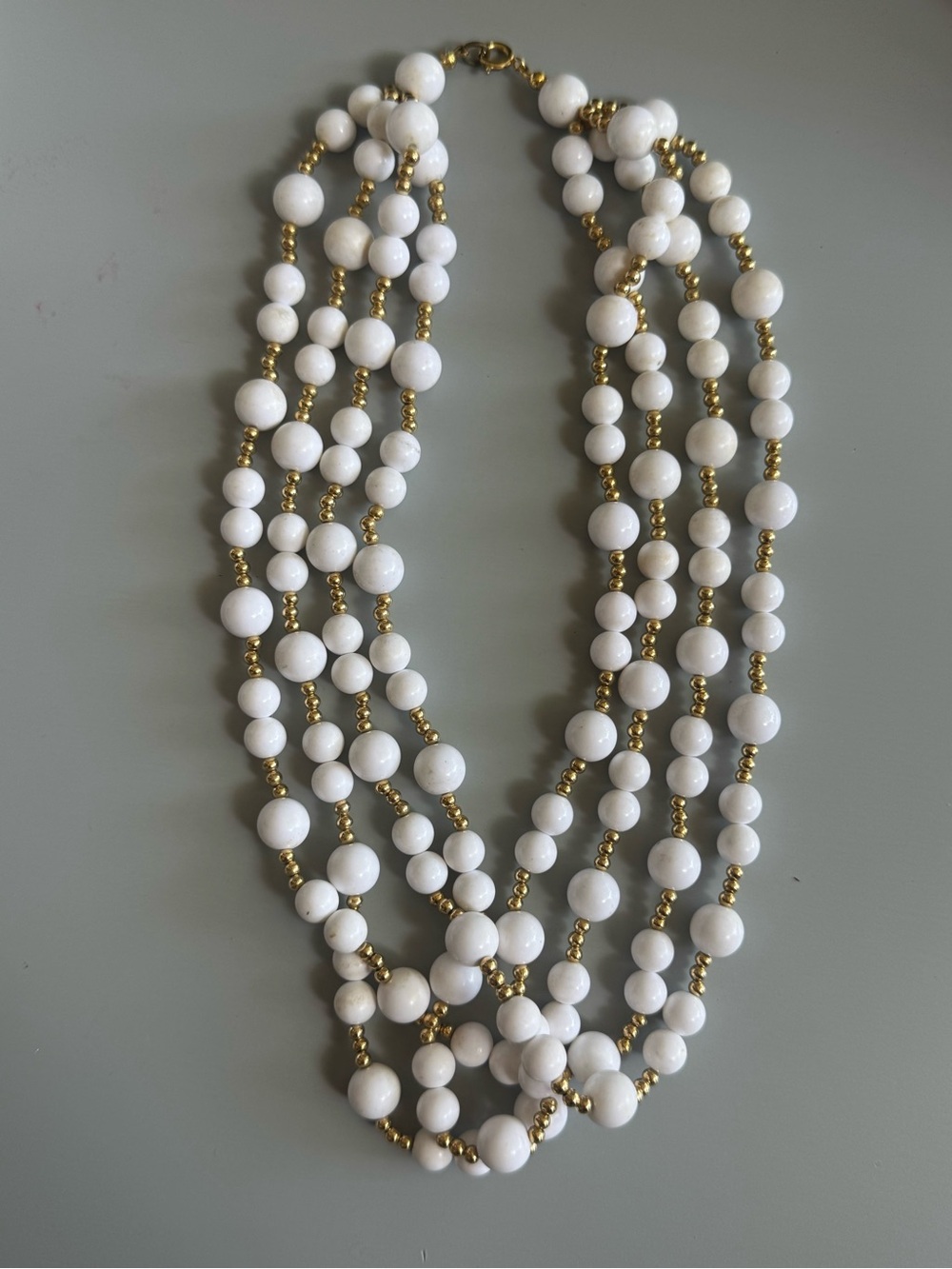 Multi-Strand White Bead Necklace with Gold Accents